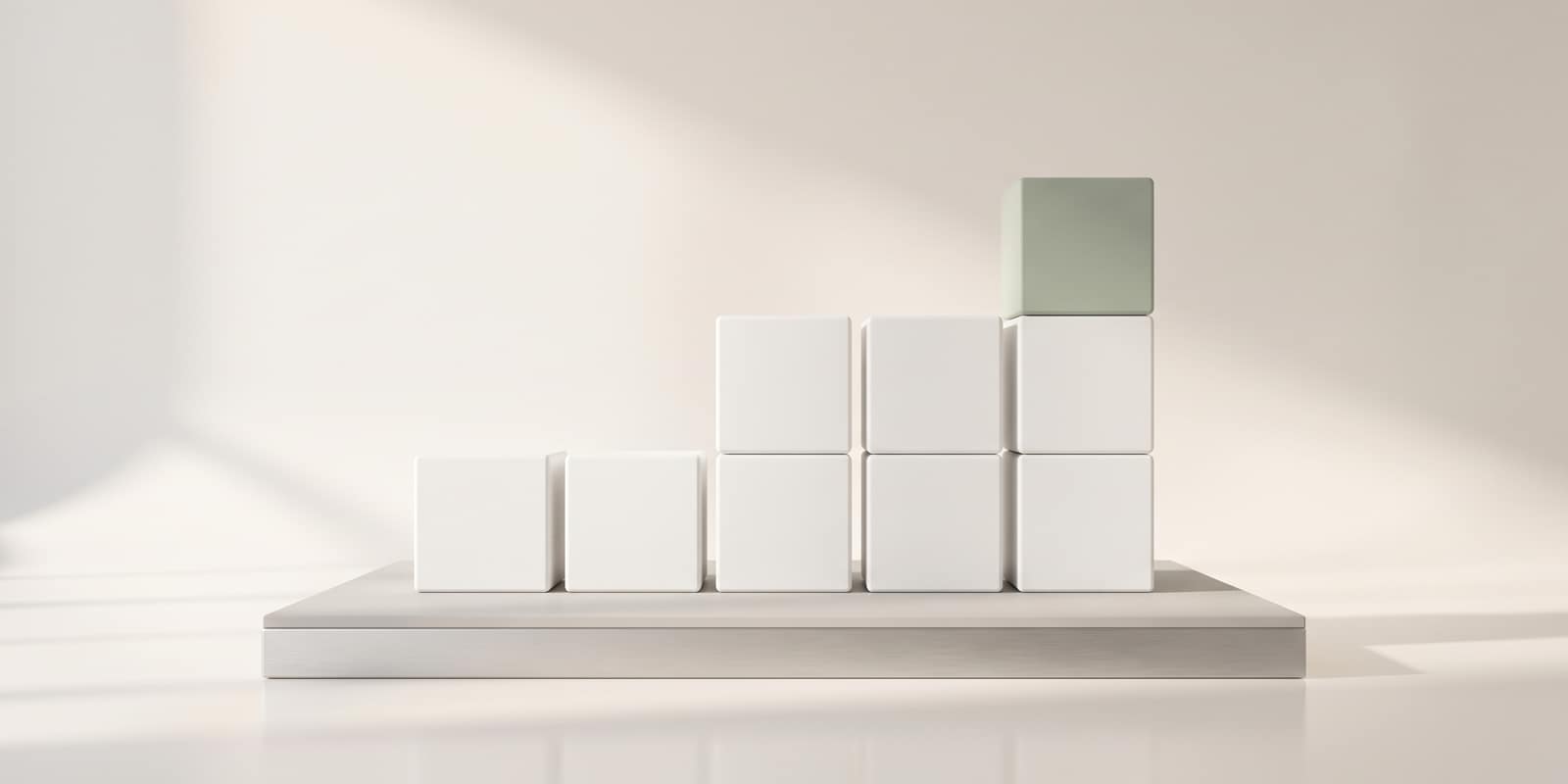 White blocks rising like a bar chart, the tallest topped in sage green