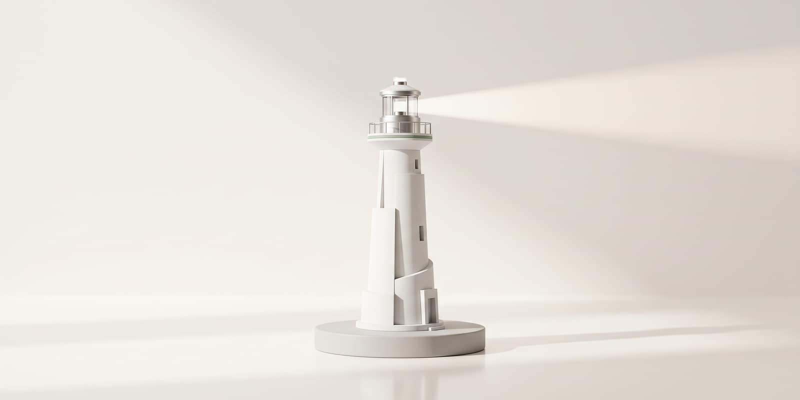A white model lighthouse casting a soft beam of light across the wall behind it